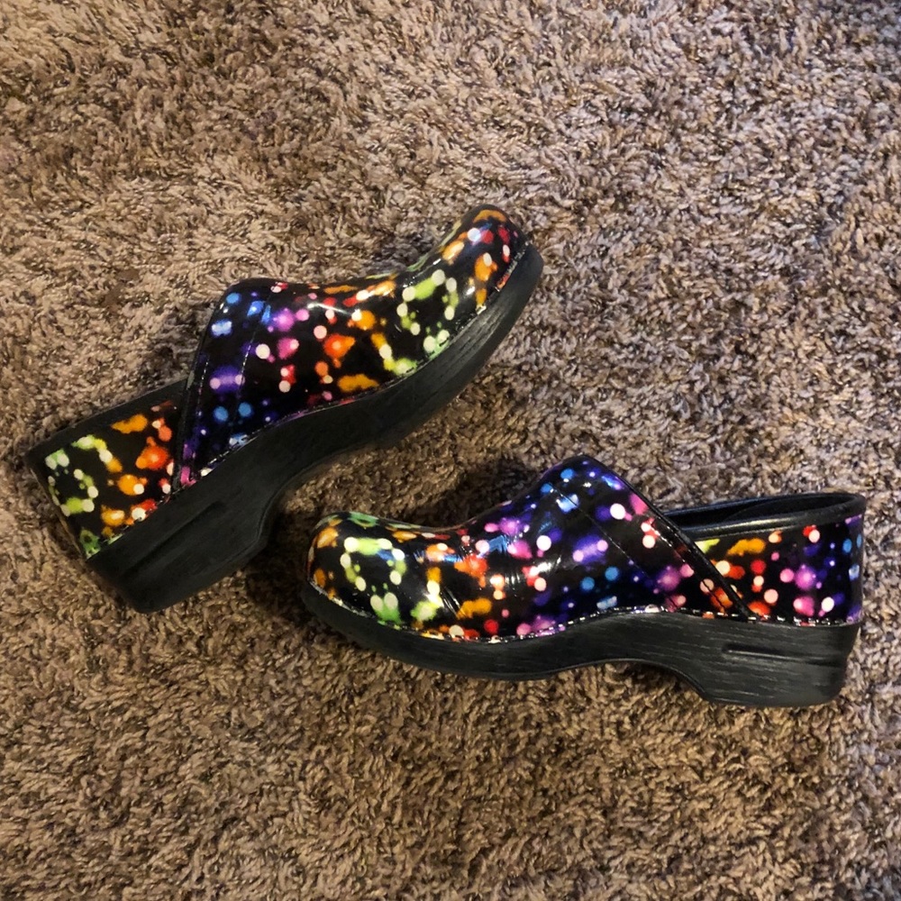 Dansko clogs- colorful design- medium wear.